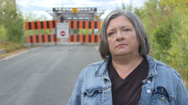 abrupt-closure-of-minto-area-bridge-leaves-neighbourhood-without-paved-road-access-|-cbc-news