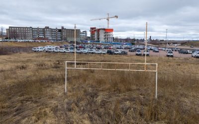 Council OKs former Moncton school sports field as parking, construction staging area | CBC News