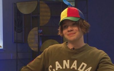 Peanut butter and propeller hats: 20-year-old from Moncton hitchhiking across Canada for cancer research | CBC News